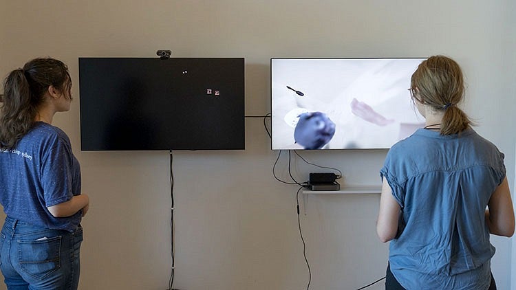 students looking at screens